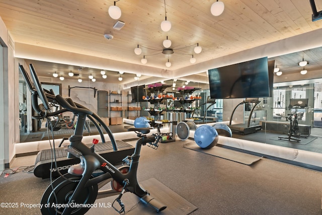 gym with wood ceiling