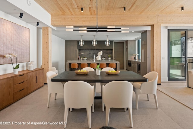 dining space featuring wooden ceiling and light speckled floor