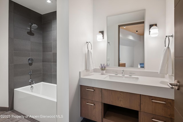 full bathroom featuring vanity and bathing tub / shower combination