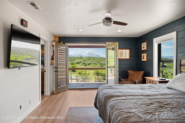248 Basalt Mountain Dr, Carbondale, CO 81623 - bedroom featuring access to outside, wood finished floors, a mountain view, ceiling fan, and recessed lighting