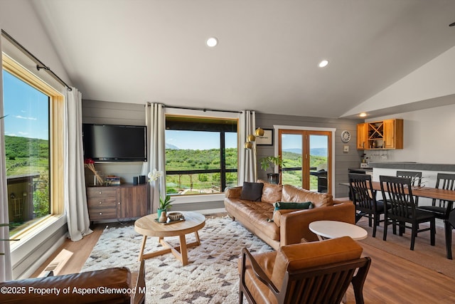 248 Basalt Mountain Dr, Carbondale, CO 81623 - living room featuring lofted ceiling, light wood-type flooring, recessed lighting, and a bar