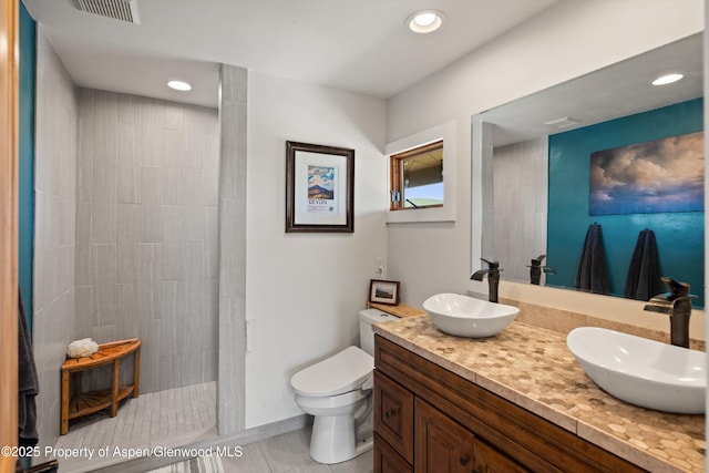 248 Basalt Mountain Dr, Carbondale, CO 81623 - full bathroom featuring double vanity, walk in shower, recessed lighting, and tile patterned flooring