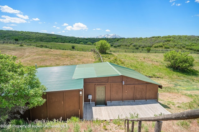 248 Basalt Mountain Dr, Carbondale, CO 81623 - view of front of property with a metal roof, a mountain view, and a view of rural / pastoral area