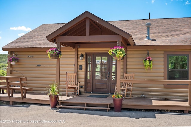 248 Basalt Mountain Dr, Carbondale, CO 81623 - view of exterior entry with a shingled roof