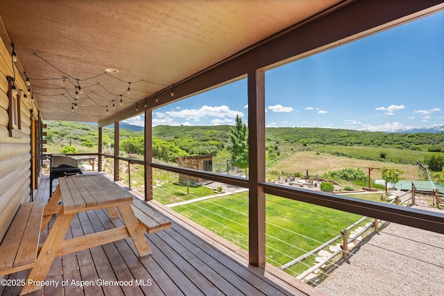 248 Basalt Mountain Dr, Carbondale, CO 81623 - wooden deck with a wooded view