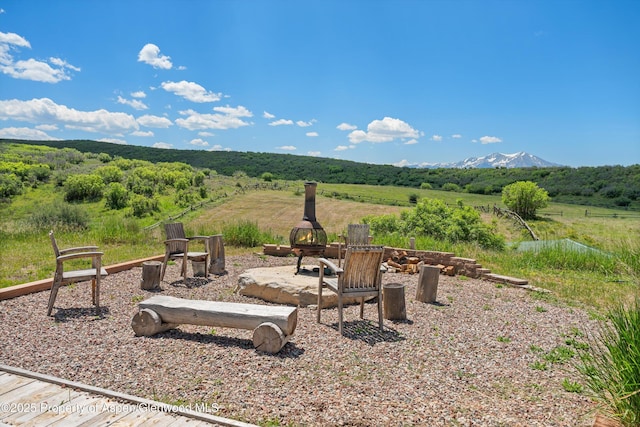 248 Basalt Mountain Dr, Carbondale, CO 81623 - view of yard with a fire pit, a mountain view, and a view of rural / pastoral area
