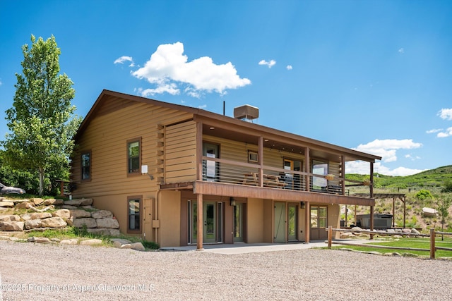 248 Basalt Mountain Dr, Carbondale, CO 81623 - back of property featuring a balcony and log siding