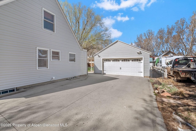 668 Taylor St, Craig, CO 81625 - view of side of home with an outdoor structure and a garage