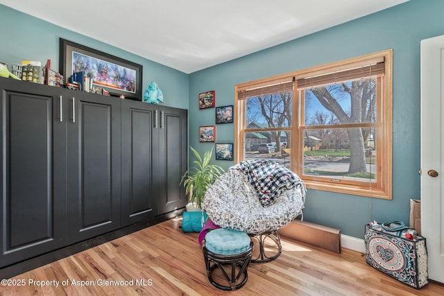 668 Taylor St, Craig, CO 81625 - sitting room with wood finished floors and baseboards