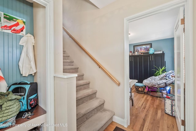 668 Taylor St, Craig, CO 81625 - staircase featuring baseboards and wood finished floors