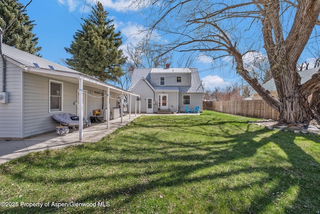 668 Taylor St, Craig, CO 81625 - view of yard featuring fence and a patio