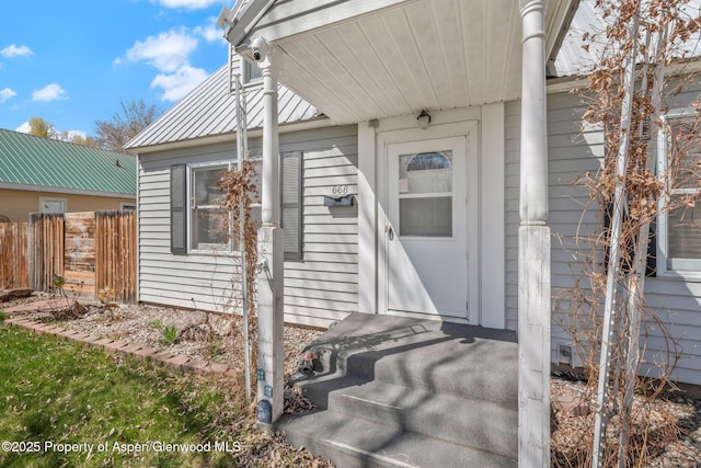 668 Taylor St, Craig, CO 81625 - property entrance with fence and metal roof