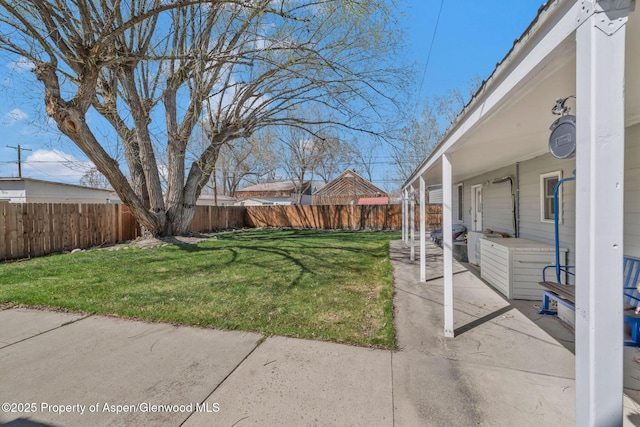 668 Taylor St, Craig, CO 81625 - view of yard featuring a patio and a fenced backyard