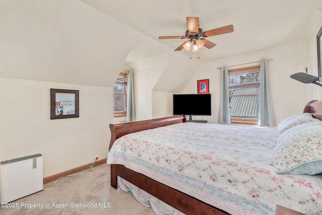 668 Taylor St, Craig, CO 81625 - bedroom featuring baseboards, ceiling fan, light colored carpet, and vaulted ceiling