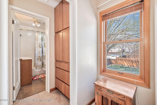668 Taylor St, Craig, CO 81625 - hallway with light tile patterned flooring