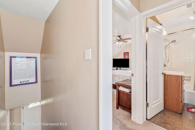 668 Taylor St, Craig, CO 81625 - hallway with light tile patterned flooring and visible vents