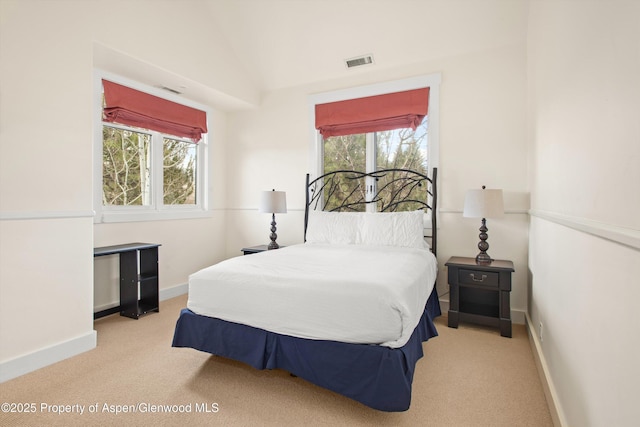 bedroom featuring carpet flooring, visible vents, and baseboards