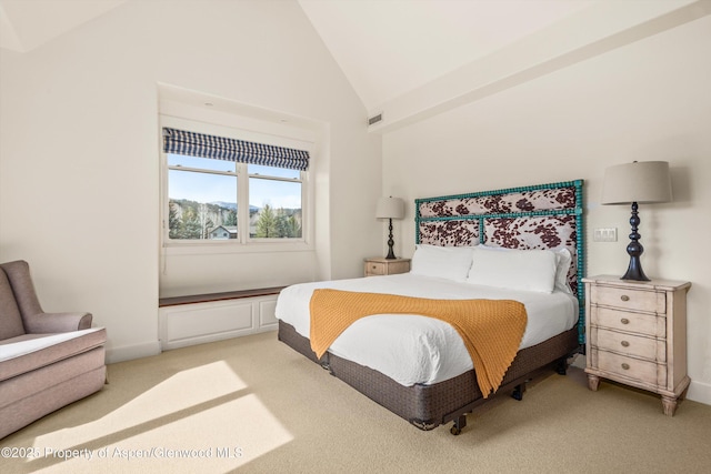 bedroom with light carpet, high vaulted ceiling, baseboards, and visible vents