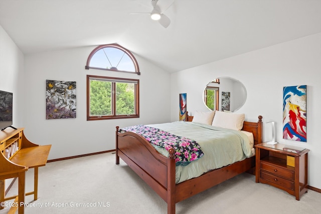 309 Deer Run, Carbondale, CO 81623 - bedroom with light colored carpet, vaulted ceiling, and ceiling fan