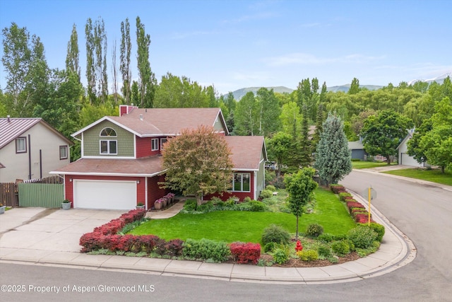 309 Deer Run, Carbondale, CO 81623 - view of front of home featuring driveway, a garage, and a mountain view