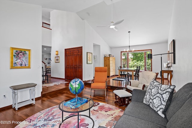 309 Deer Run, Carbondale, CO 81623 - living room featuring a chandelier, wood finished floors, a ceiling fan, high vaulted ceiling, and stairs