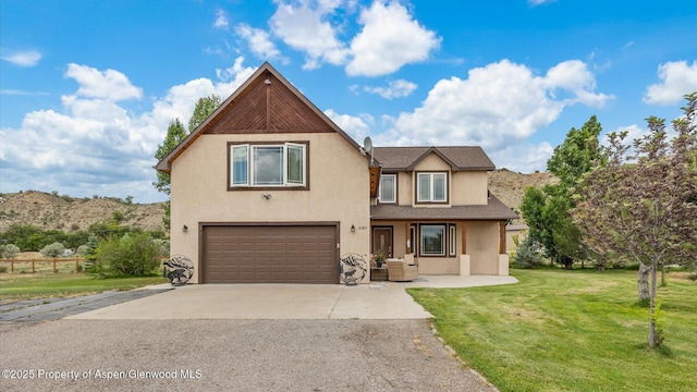 83 Native Springs Dr, Rifle, CO 81650 - view of front of property featuring an attached garage, driveway, stucco siding, a front yard, and roof with shingles