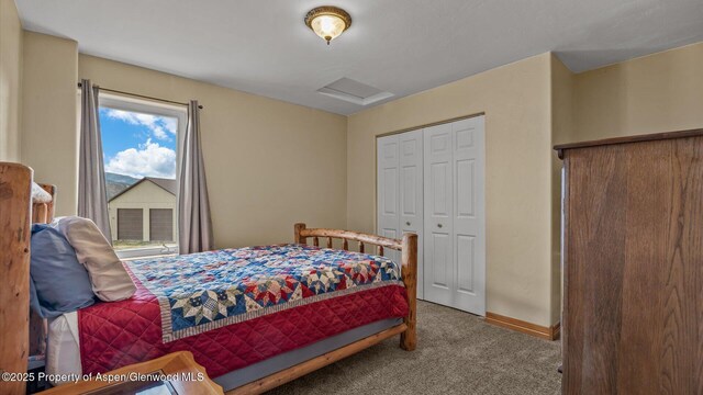 83 Native Springs Dr, Rifle, CO 81650 - carpeted bedroom with attic access and a closet