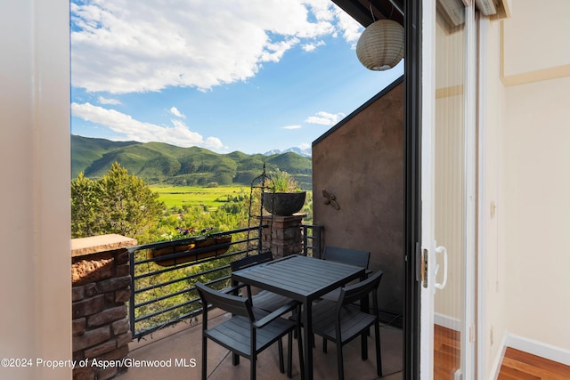 balcony featuring a mountain view