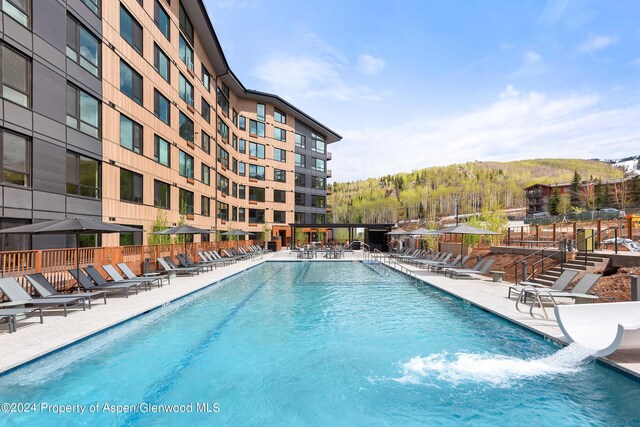 view of pool featuring a patio