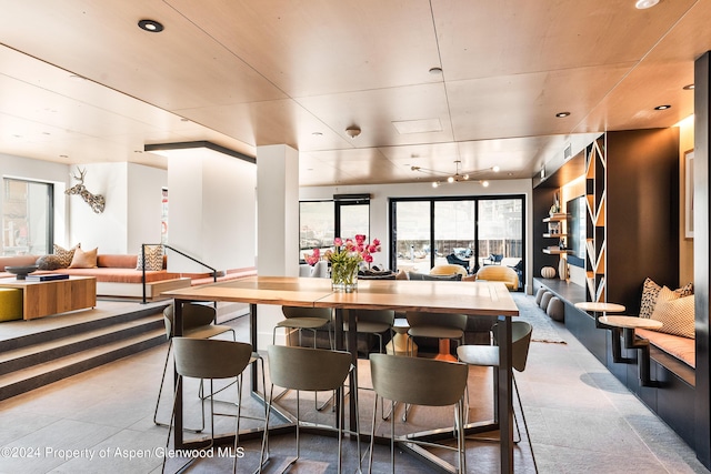 dining room featuring ceiling fan