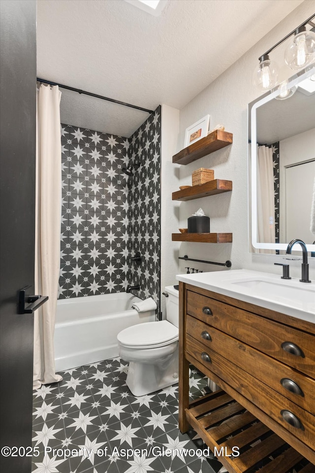 294 Snowmass Club Cir Unit 1207, Snowmass Village, CO 81615 - full bathroom with tile patterned floors, vanity, toilet, and shower / bathtub combination with curtain