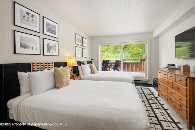 294 Snowmass Club Cir Unit 1207, Snowmass Village, CO 81615 - bedroom featuring a textured ceiling