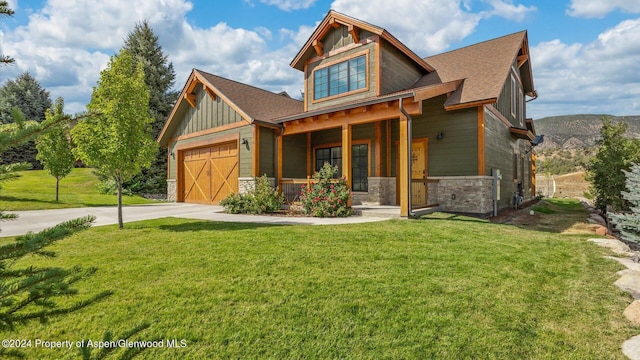 craftsman house featuring a front lawn, stone siding, a porch, board and batten siding, and a garage