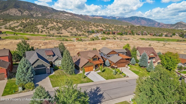 aerial view featuring a residential view and a mountain view