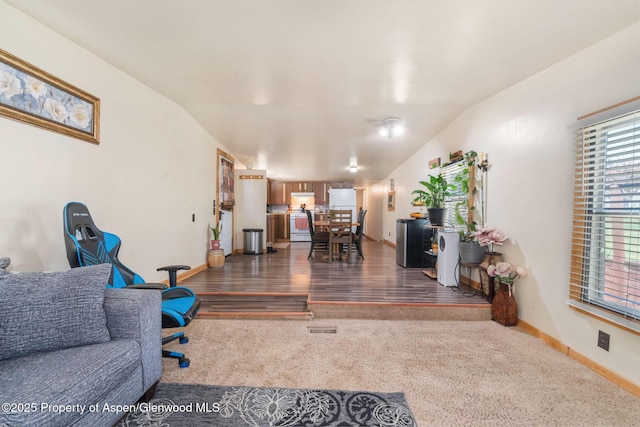 1618 Barclay St, Craig, CO 81625 - living room featuring dark colored carpet and baseboards