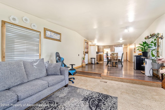 1618 Barclay St, Craig, CO 81625 - living room featuring carpet flooring, wood finished floors, and baseboards