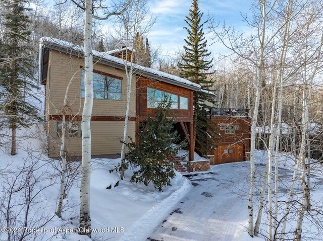 view of snow covered property