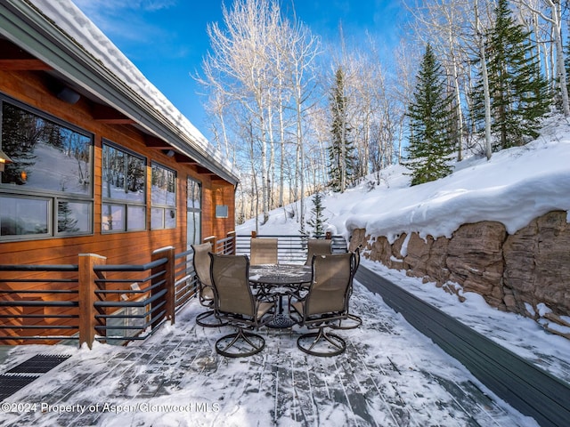 view of snow covered deck