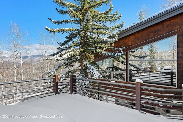 view of snow covered deck