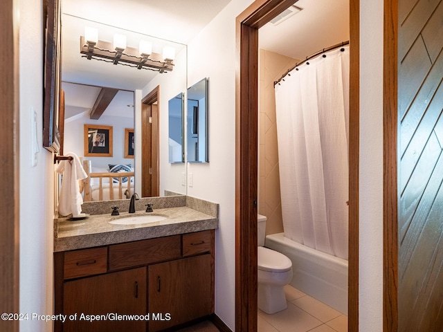 full bathroom with vanity, tile patterned flooring, toilet, shower / bathtub combination with curtain, and beamed ceiling