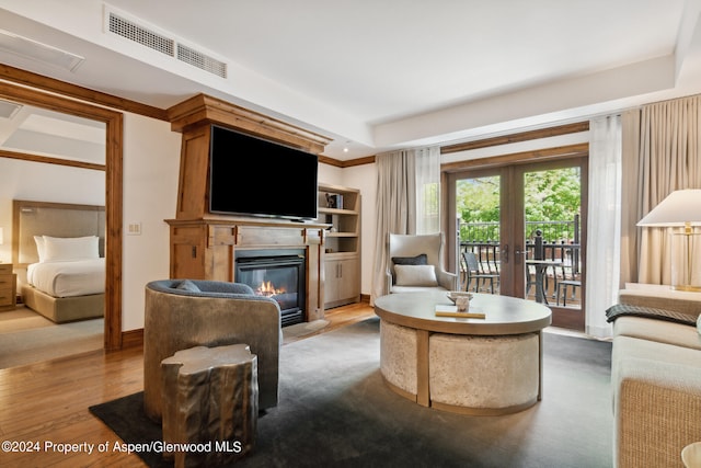 living room featuring french doors and wood-type flooring