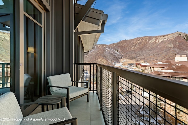 balcony featuring a mountain view