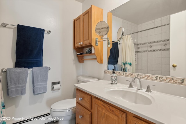 534 Spruce St, Aspen, CO 81611 - bathroom with vanity, a baseboard heating unit, toilet, and tiled shower