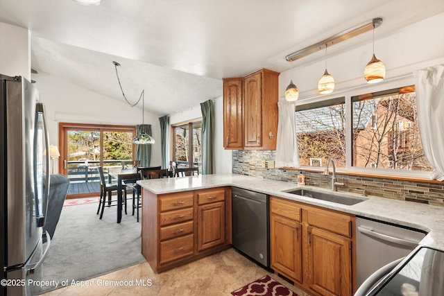 534 Spruce St, Aspen, CO 81611 - kitchen with brown cabinetry, a sink, and stainless steel appliances