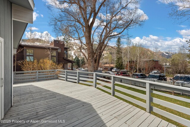 534 Spruce St, Aspen, CO 81611 - wooden deck featuring a yard and a mountain view