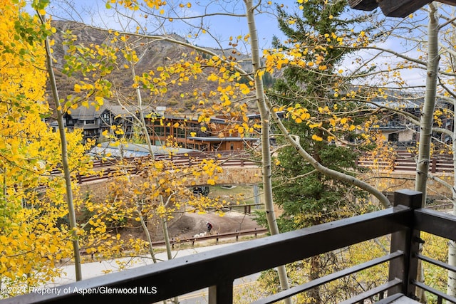 balcony featuring a mountain view