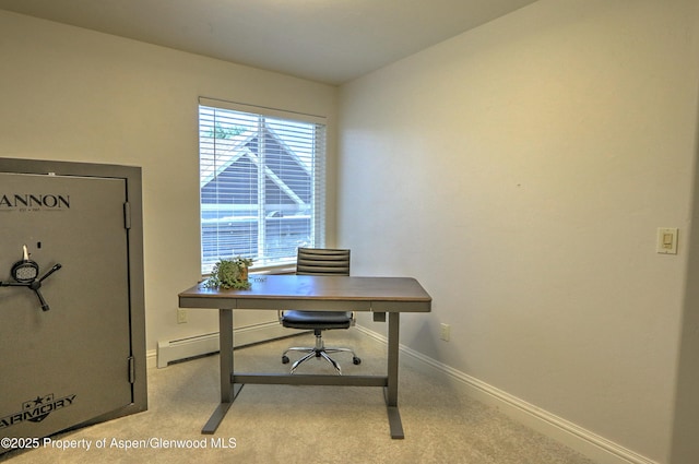 carpeted office space with baseboards