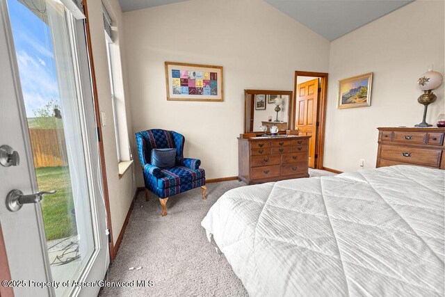 carpeted bedroom featuring multiple windows, vaulted ceiling, access to outside, and baseboards