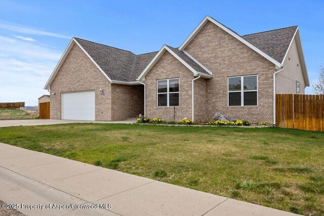 view of front facade with an attached garage, brick siding, concrete driveway, and roof with shingles