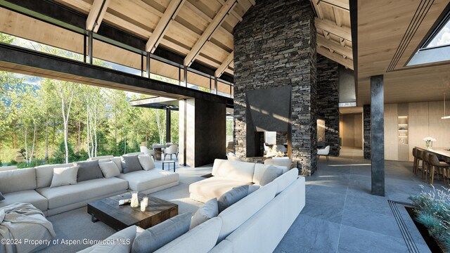 view of patio / terrace with an outdoor living space with a fireplace and exterior bar